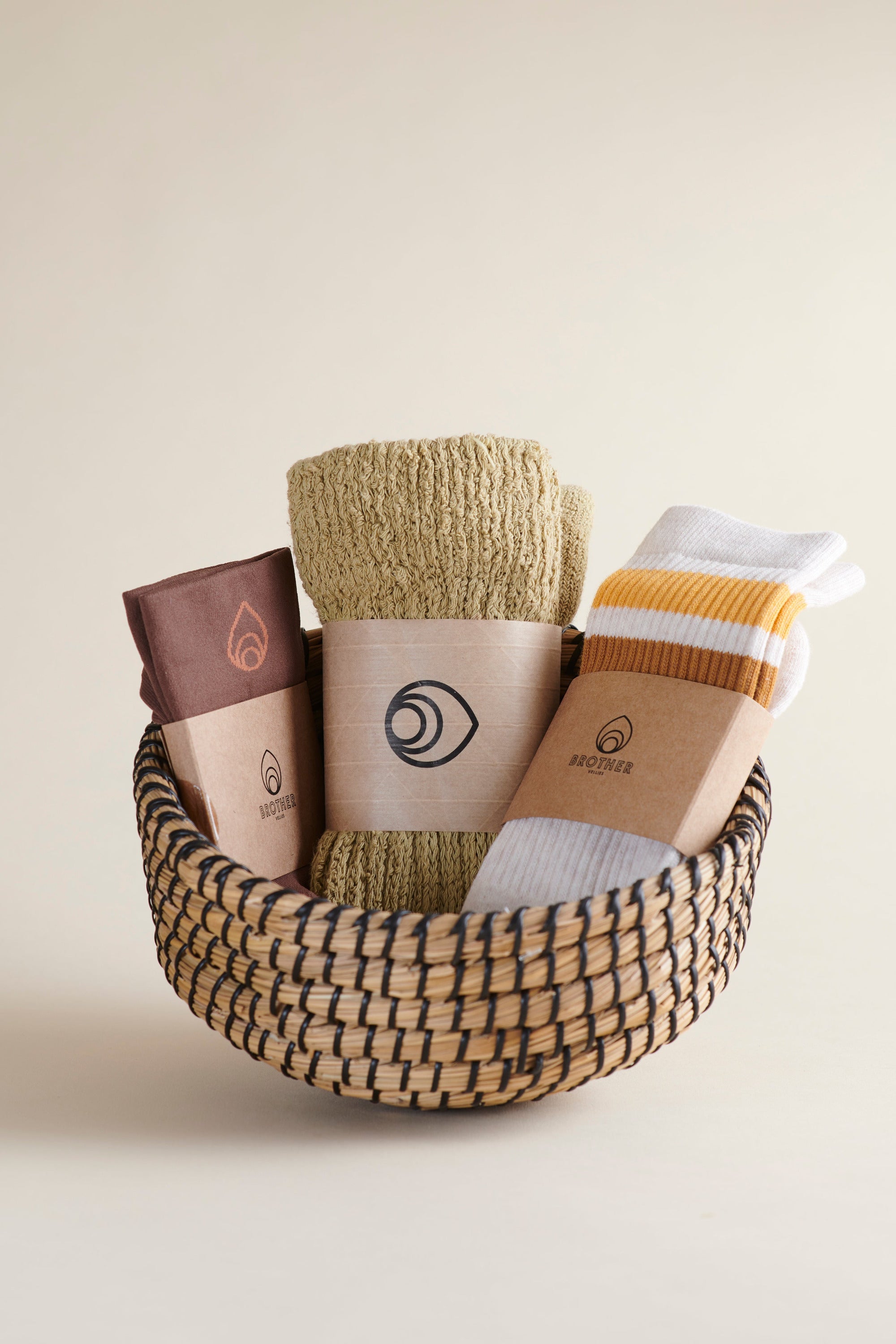 Brother Vellies Trackstar Bundle featuring the Cloud Socks in Latte, Varsity Sock in Marigold, and Perfect Ankle Sock in Grace