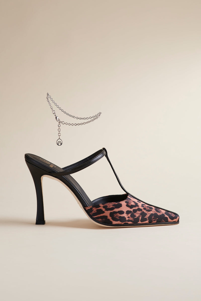 A 3.5" inch heel with faux leopard print toe covering and ankle charm.