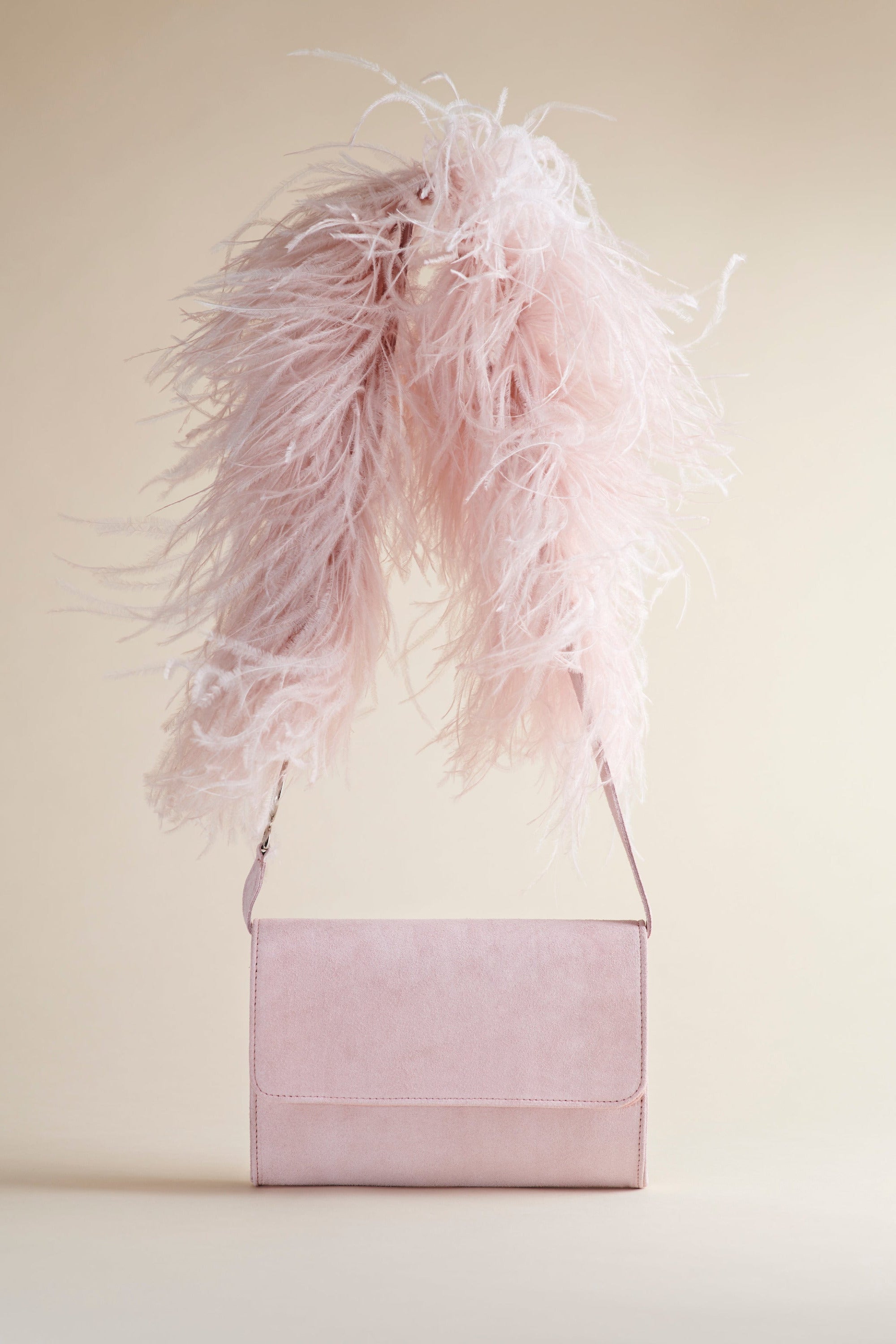 Brother Vellies Lijadu Bird Bag in Candy Floss on beige background