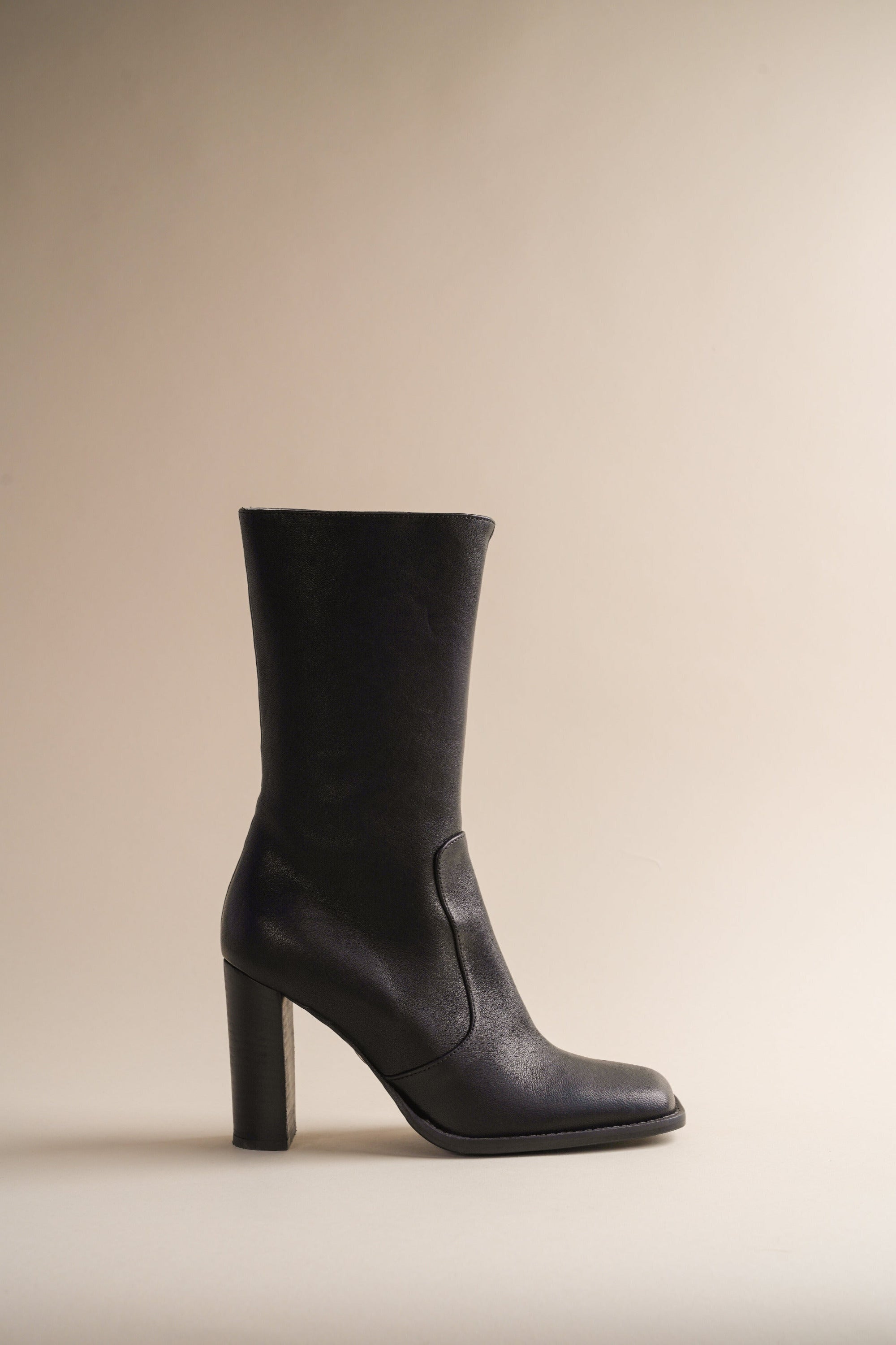 Brother Vellies Lauryn Boot in Midnight on beige background