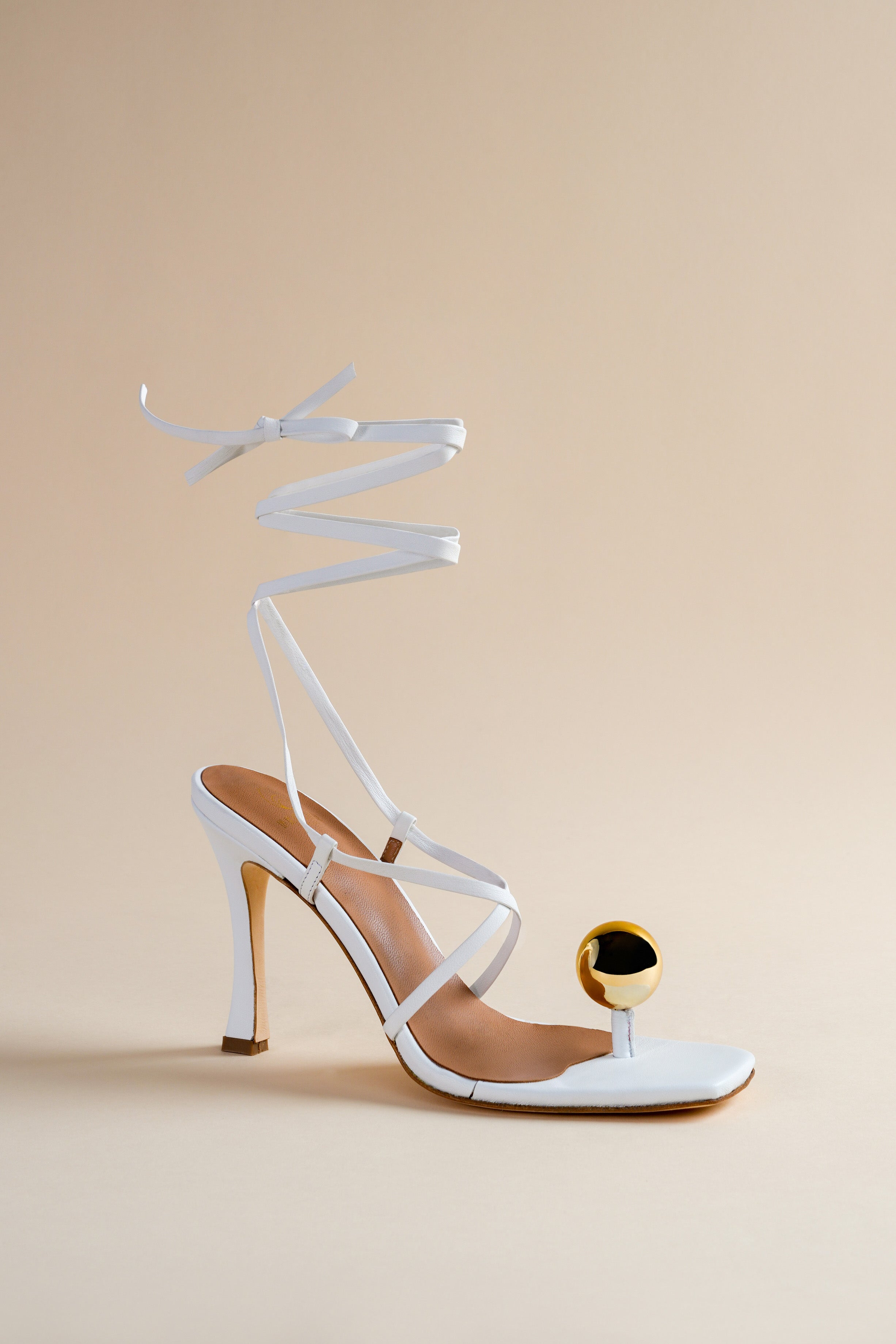  Globe sandal in white nappa leather and golden globe