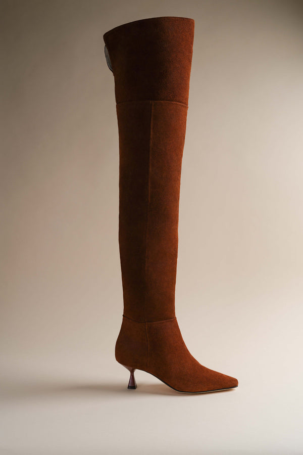 Thigh high boot in cognac suede and a kitten heel